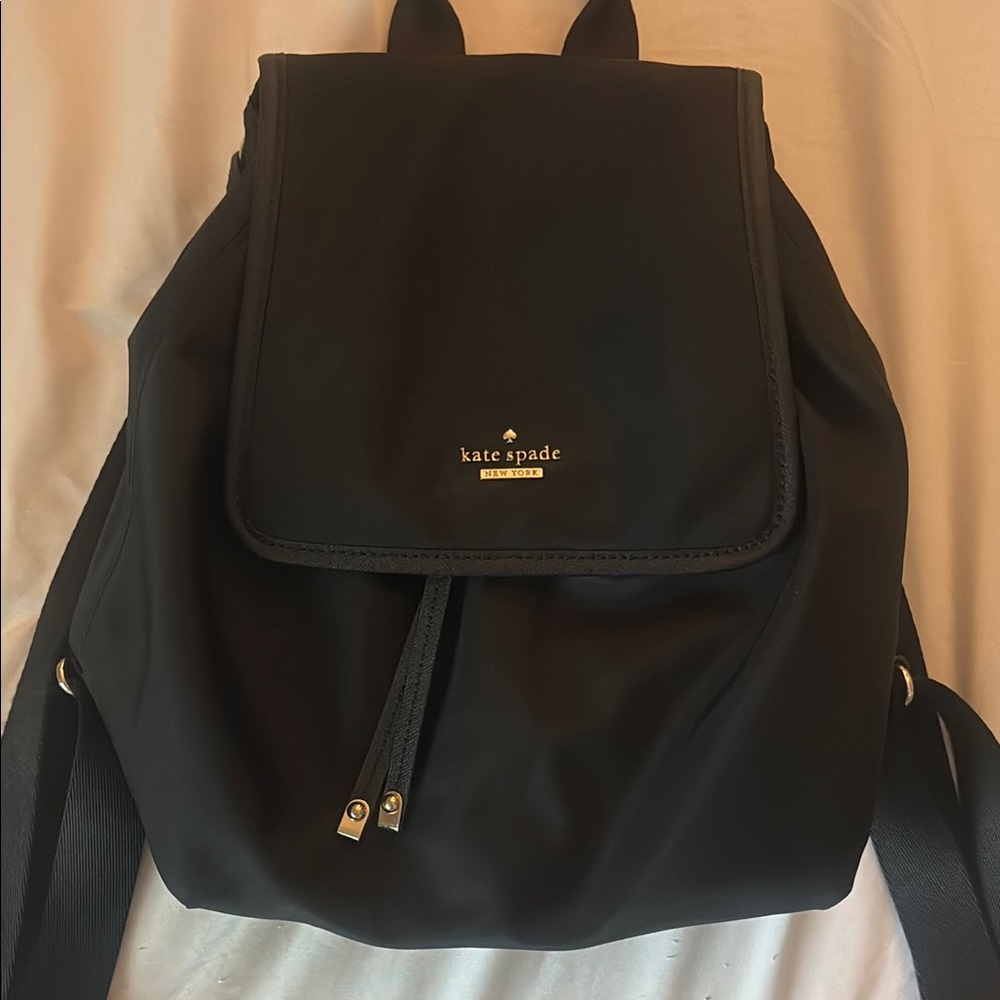 Kate Spade Black Minimalist Backpack with Gold Accents